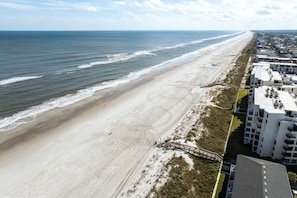 Beach nearby, beach towels, surfing, motor boating