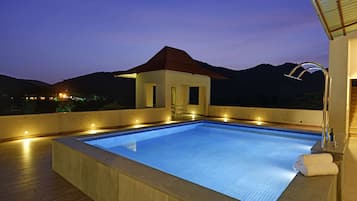 Outdoor pool, pool umbrellas, pool loungers