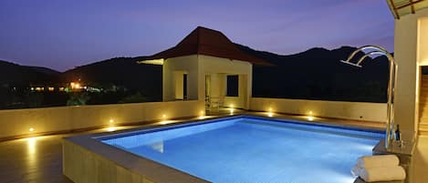 Outdoor pool, pool umbrellas, pool loungers