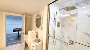 Combined shower/tub, hair dryer, towels, soap