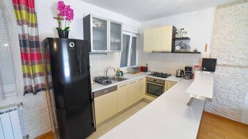 Villa (Three Bedroom Villa with Swimming poo) | Private kitchen | Fridge