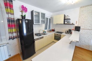 Villa (Three Bedroom Villa with Swimming poo) | Private kitchen | Fridge