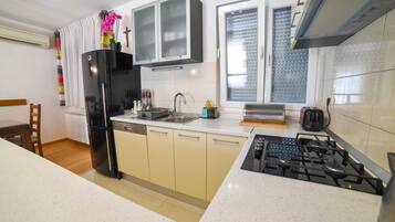 Villa (Three Bedroom Villa with Swimming poo) | Private kitchen | Fridge