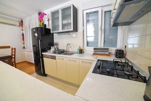 Villa (Three Bedroom Villa with Swimming poo) | Private kitchen | Fridge