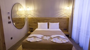 Literie de qualité supérieure, minibar, décoration personnalisée, bureau