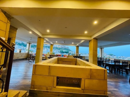 Breakfast, lunch, dinner served; Indian cuisine, al fresco dining