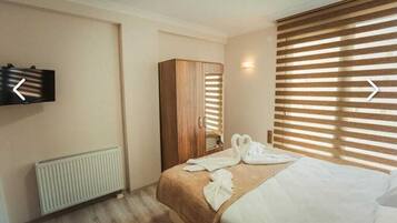 Premium bedding, minibar, desk, laptop workspace