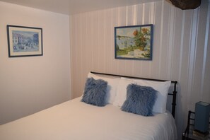 2 habitaciones, tabla de planchar con plancha, internet y ropa de cama