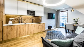Apartamento superior | Zona de estar | Una Smart TV, suelo radiante