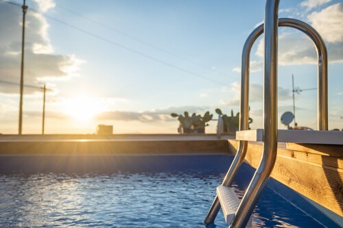 Villa with pool and gym just steps from the beach!