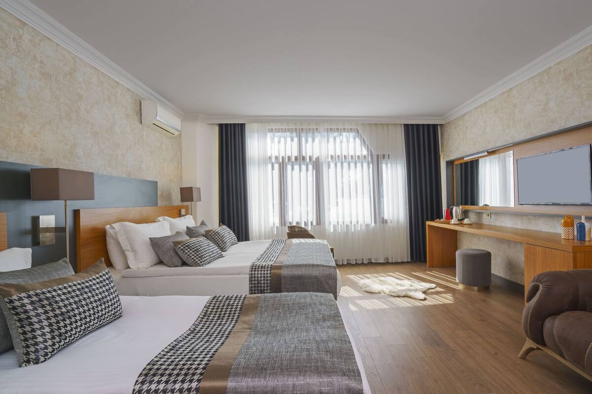 Deluxe Room With Balcony | Sengetøy i egyptisk bomull og sengetøy av topp kvalitet