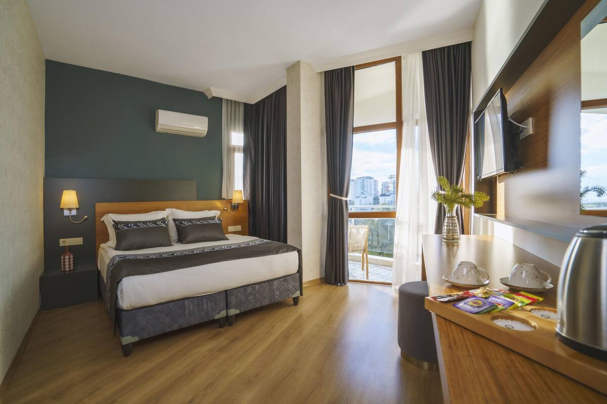 Family Room With Balcony | Sengetøy i egyptisk bomull og sengetøy av topp kvalitet
