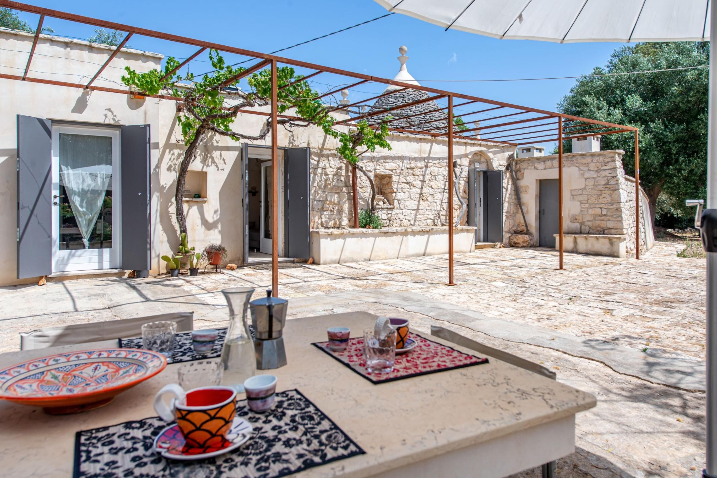 Family Villa, Multiple Bedrooms, 2 Bathrooms (Trullo Fedele Grande125) | Outdoor dining