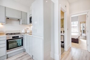 Fridge, oven, stovetop, dishwasher - The Village Vixen Hampstead - by Out of Office Lifestyle (Greater London)