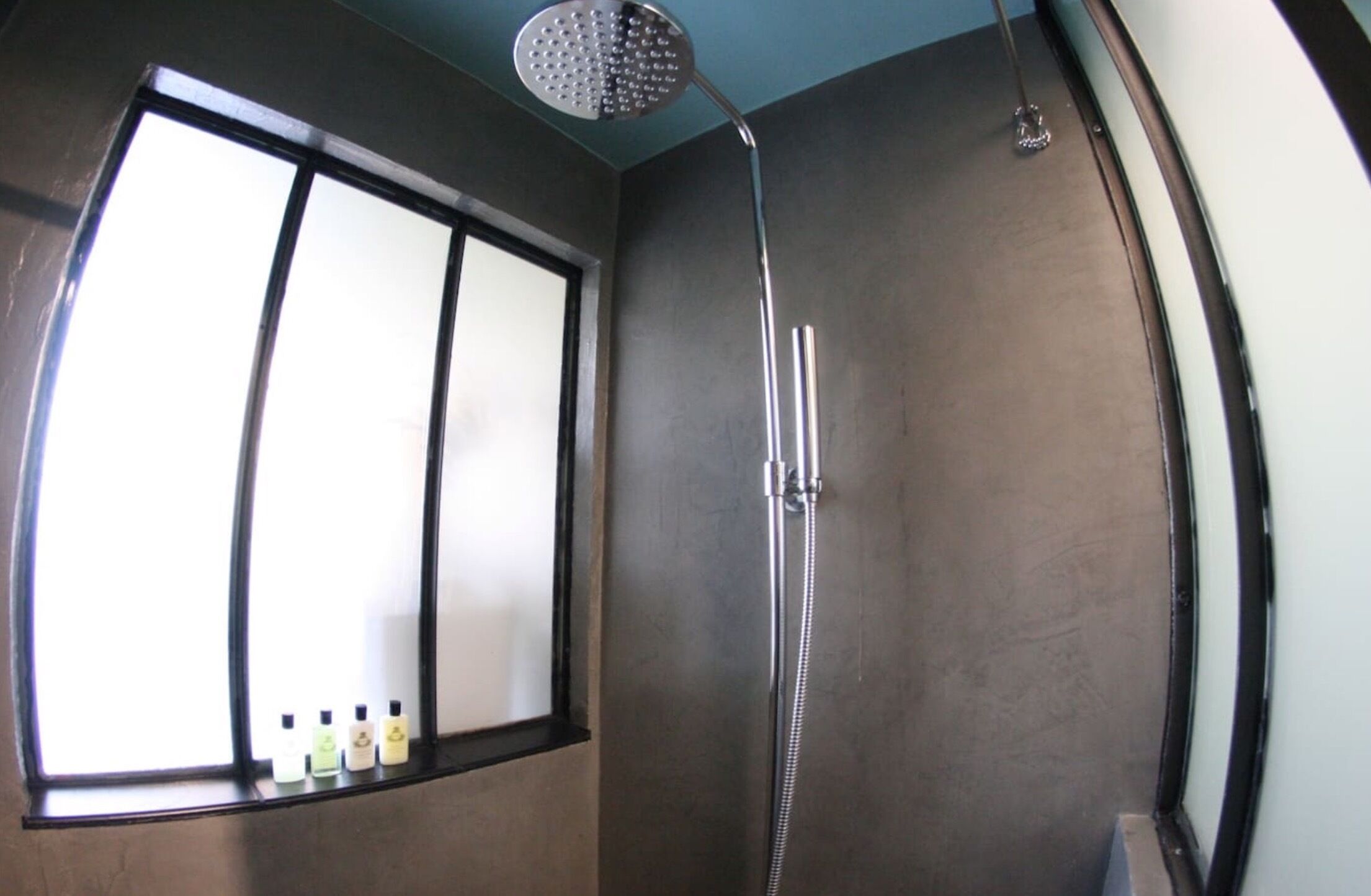 Bathtub, hair dryer, towels, soap