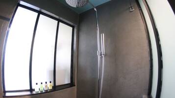 Bathtub, hair dryer, towels, soap