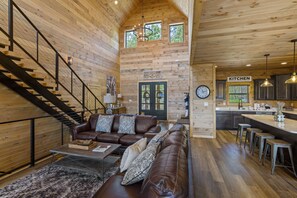 Cabin, 5 Bedrooms | Living room | 65-inch Smart TV with cable channels - The Hidden Owl Mountain Lodge 5 Bedroom Cabin by RedAwning (Sevierville)