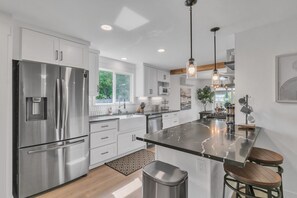 Bungalow, 3 Bedrooms | Private kitchen | Fridge, oven, coffee/tea maker, toaster - Adorably Renovated Spacious Bungalow 3 Bedroom Bungalow by Redawning (Renton)