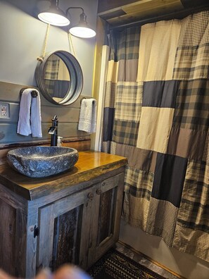 Combined shower/tub, hair dryer, towels, toilet paper