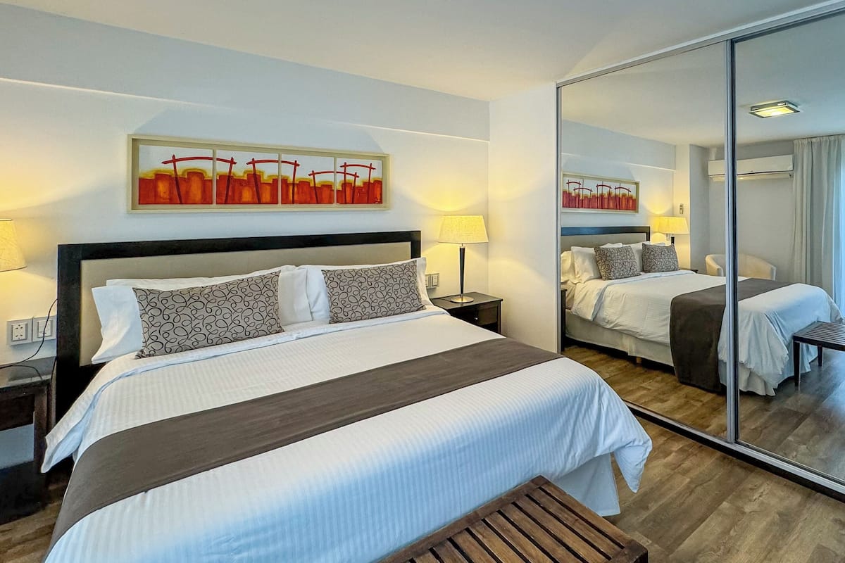 Suite familiar, vista al lago | Ropa de cama de alta calidad, camas con pillow-top y minibar 