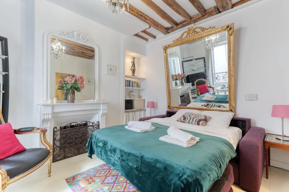 1 bedroom, desk, iron/ironing board, travel crib