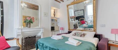 1 bedroom, desk, iron/ironing board, travel crib