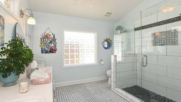 Shower, hair dryer, towels, soap