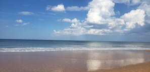 On the beach, sun loungers, beach towels