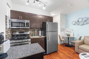 Standard Apartment, 1 Queen Bed with Sofa bed, Non Smoking (Suite Ten) | Private kitchen | Full-size fridge, microwave, oven, stovetop
