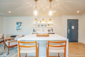 Luxury Studio Suite | Living area | 55-inch Smart TV with cable channels, TV