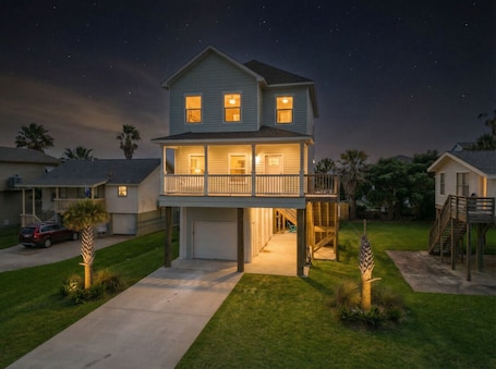 Exterior. Modern Coastal Retreat with Pool and Fire Pit
