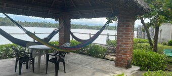 Cottage rustic house water front near mangrove area