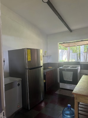 Fridge, stovetop, coffee/tea maker, toaster