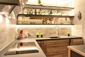 Fridge, oven, stovetop, dining tables