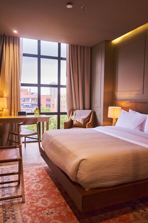 Deluxe Room | Premium bedding, down comforters, minibar, in-room safe - Hotel Coco By OxoHotel (Bogotá)