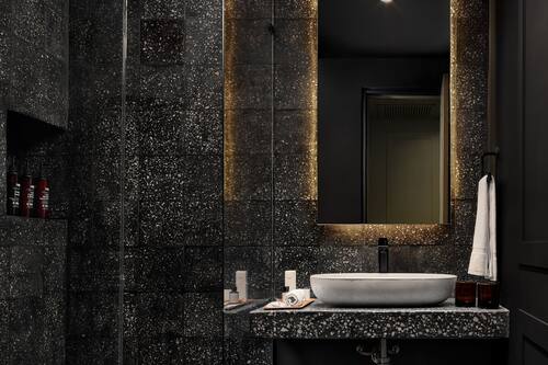 Shower, rainfall showerhead, hair dryer, towels