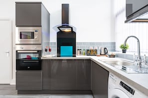 Fridge, microwave, oven, coffee/tea maker