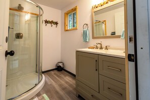Shower, towels, soap, toilet paper