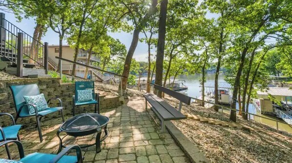 Relax in a serene outdoor space surrounded by lush greenery and scenic views.