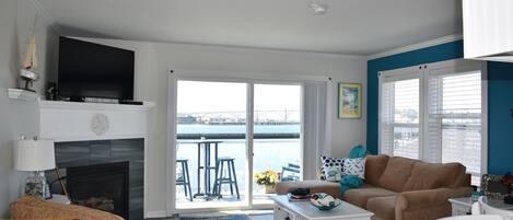 TV, fireplace, books, offices