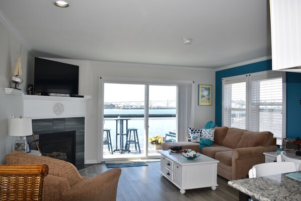 TV, fireplace, books, offices