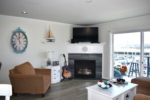 TV, fireplace, books, offices