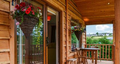 Canadian timber lodge with direct views to the Alpacas.