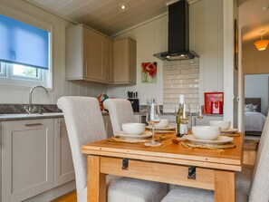 Dining - Canadian timber lodge with direct views to the Alpacas. (Rowrah, near Cockermouth)