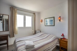 2 slaapkamers, een strijkplank/strijkijzer