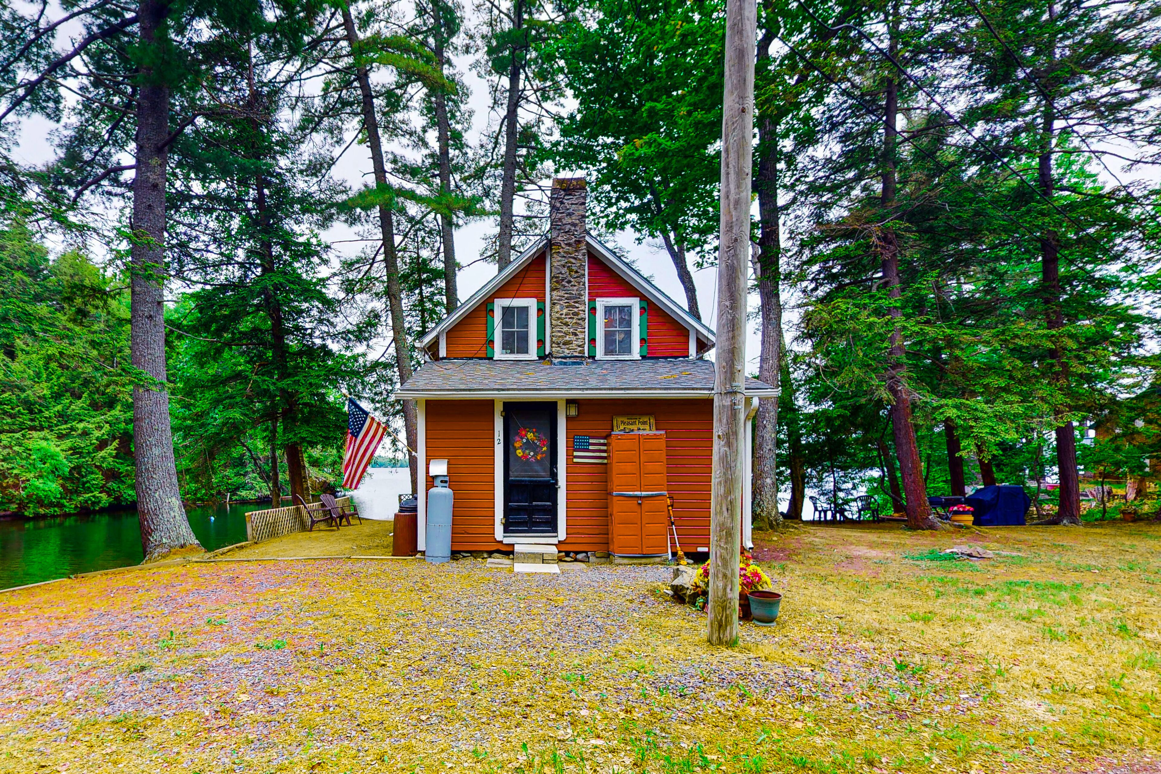 Rustic, lakefront fishing cabin on Webber Pond with sunset views - 2 dogs OK