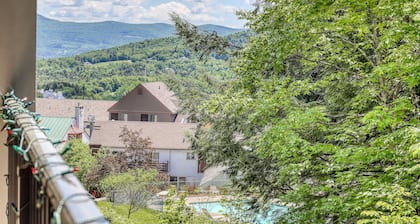 Comfortable ski-in/out condo with pool, balcony, high-speed WiFi & hiking nearby