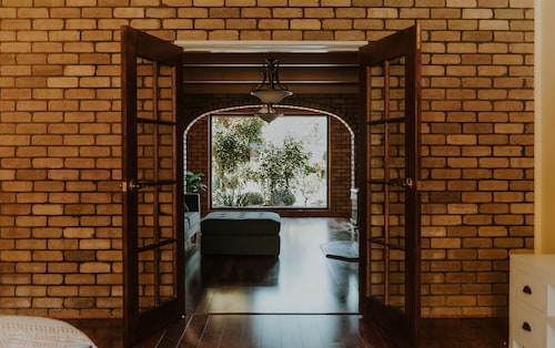 A tranquil & luxurious 4 bedroom home with a pool & wood fire