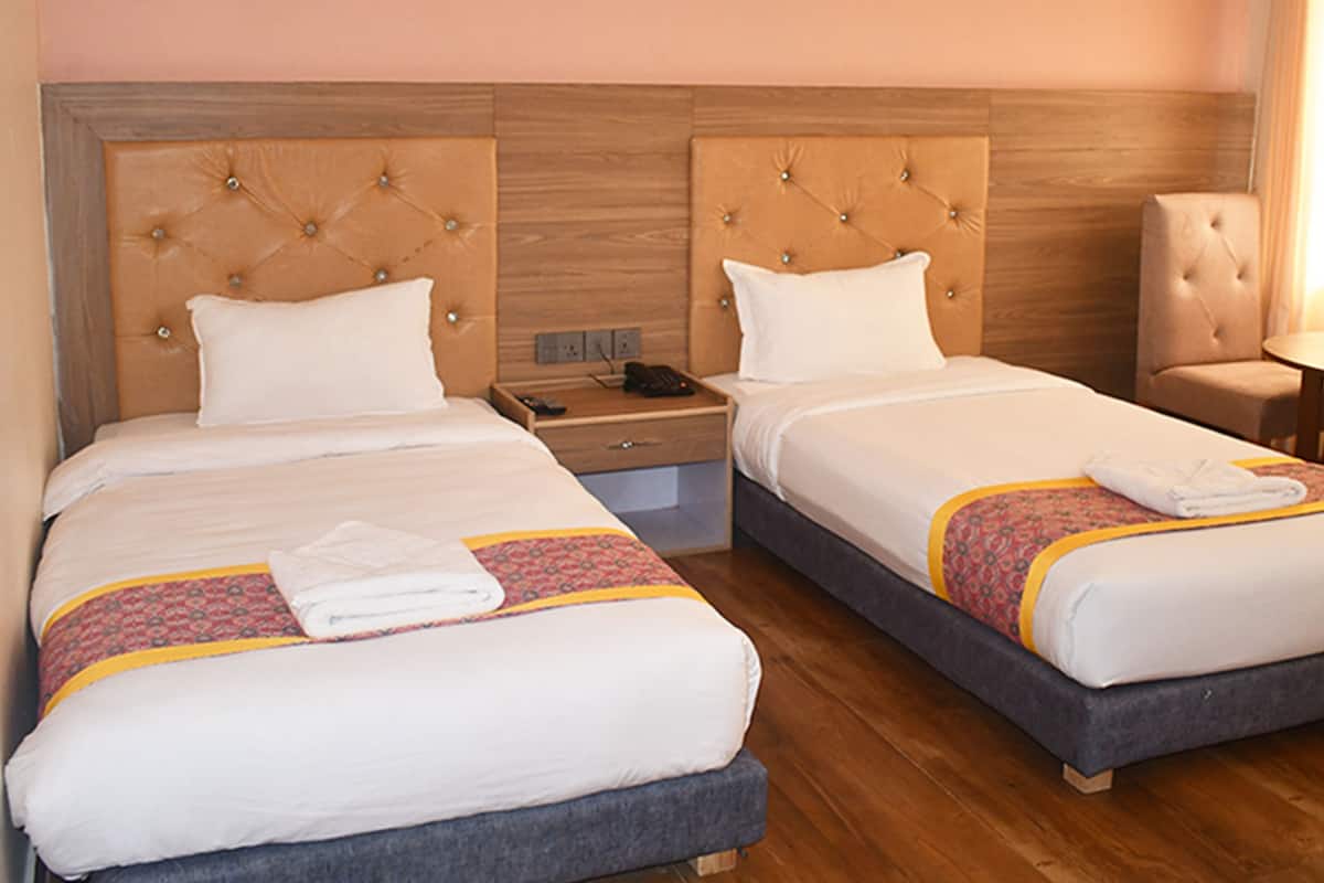 Camera Deluxe con 2 letti singoli | Biancheria da letto di alta qualità, con stile personalizzato
