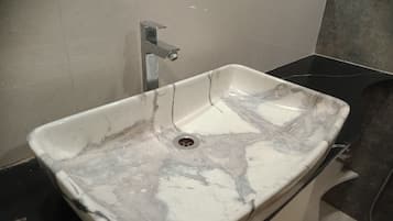Standard Room | Bathroom | Shower, towels, soap, toilet paper